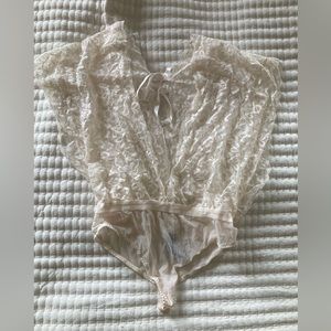 Adore Me flowy Cream lace bodysuit